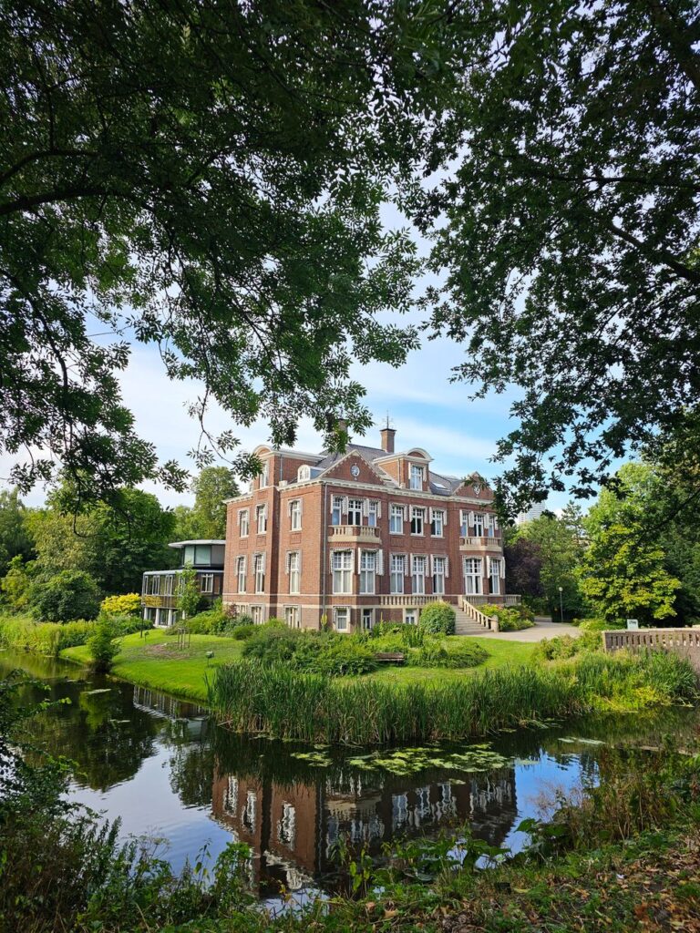 mansion house by pond